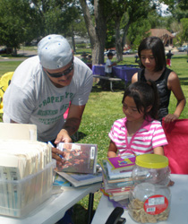 Since 2004, the Pueblo City-County Library has offered Books in the Park, a program that brings books and fun programming to parks that serve free lunches to kids through the Summer Food Service Program.