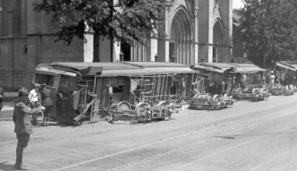 Overturned streetcars at Colfax and Logan, Denver, August 1920